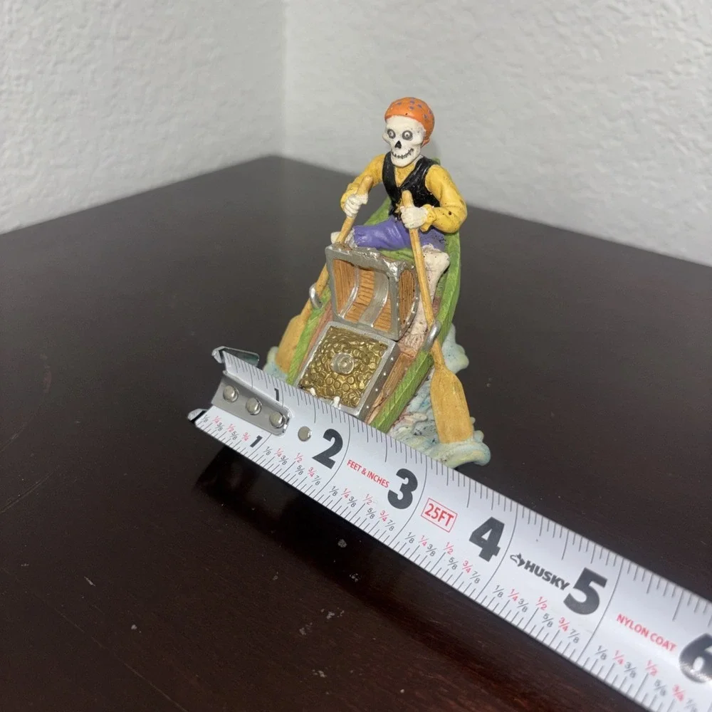 Aquarium decoration, skeleton pirate on row boat with treasure
